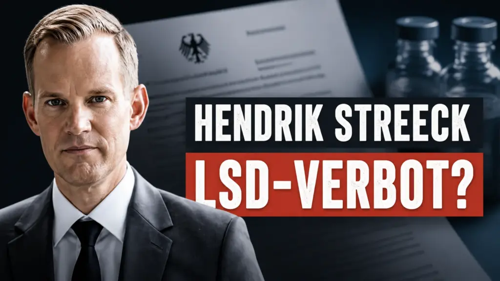 Hendrik Streeck vor einem Dokument zum Thema Catch-all-Regel und LSD-Verbot